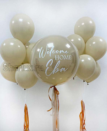 Большой шар с надписью Welcome home Ева